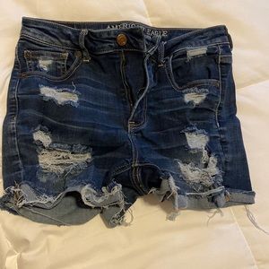 ripped, dark wash denim AE shorts